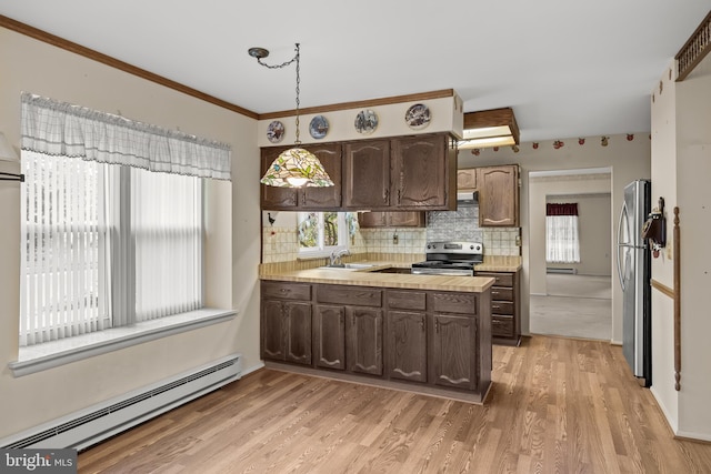48 Dunstable Rd, Southampton, NJ 08088 - kitchen featuring baseboard heating, appliances with stainless steel finishes, a sink, light countertops, and dark brown cabinets