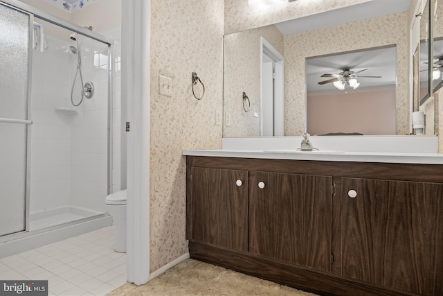 48 Dunstable Rd, Southampton, NJ 08088 - bathroom with ceiling fan, a shower stall, vanity, toilet, and wallpapered walls