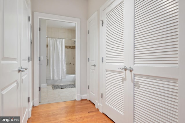 1023 N Royal St Unit 104, Alexandria, VA 22314 - corridor with light tile patterned flooring and baseboards