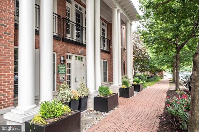 1023 N Royal St Unit 104, Alexandria, VA 22314 - entrance to property with brick siding and a porch