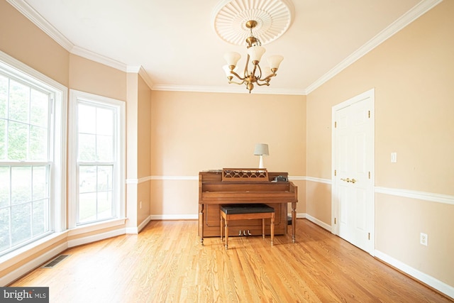 105 Fairfield Dr, Winchester, VA 22602 - living area with wood finished floors, baseboards, a chandelier, and ornamental molding