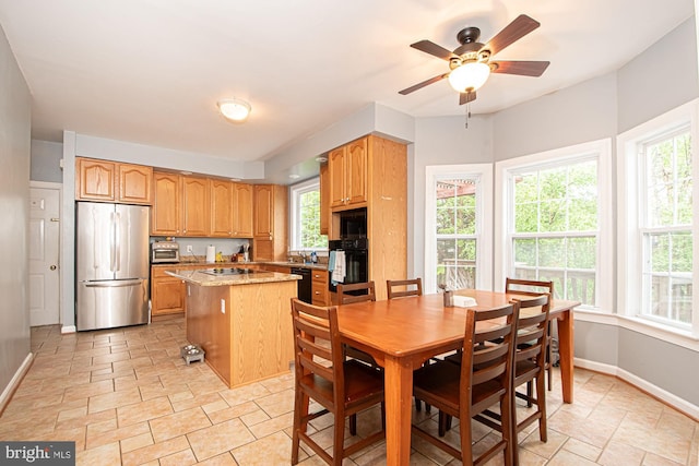 105 Fairfield Dr, Winchester, VA 22602 - dining room with baseboards and a ceiling fan
