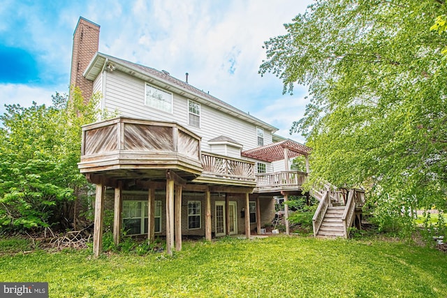 105 Fairfield Dr, Winchester, VA 22602 - back of house featuring a chimney, a deck, a lawn, and stairway