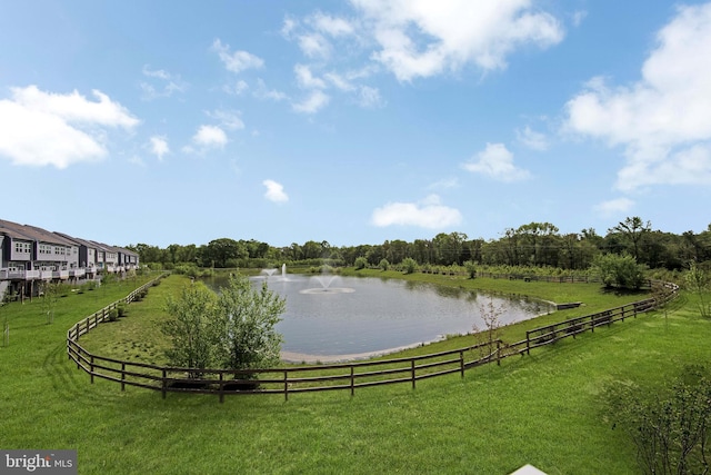 water view featuring a rural view and fence