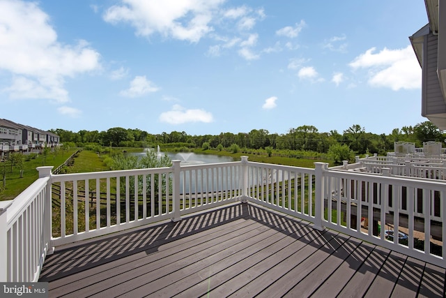 deck featuring a water view