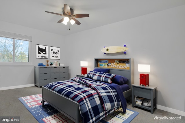bedroom with baseboards and a ceiling fan