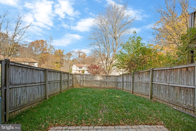 view of yard featuring a fenced backyard