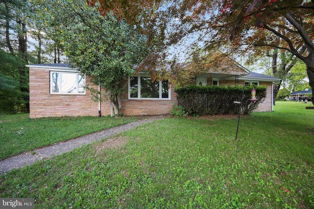 2115 Pennington, Ewing, NJ 08638 - back of house with a lawn and stone siding