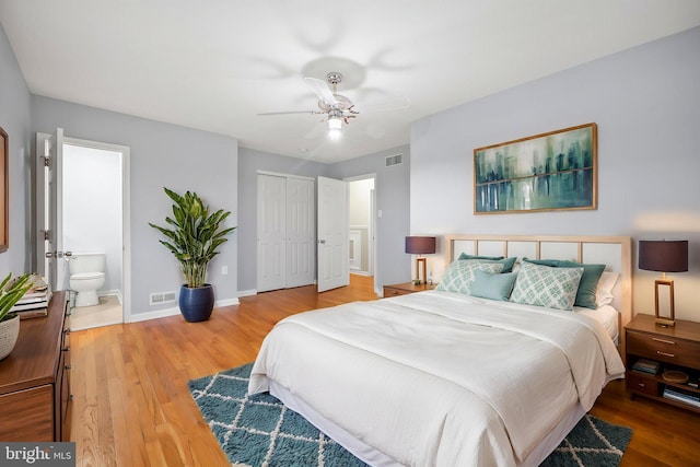 2115 Pennington, Ewing, NJ 08638 - bedroom with wood finished floors, connected bathroom, baseboards, a ceiling fan, and a closet