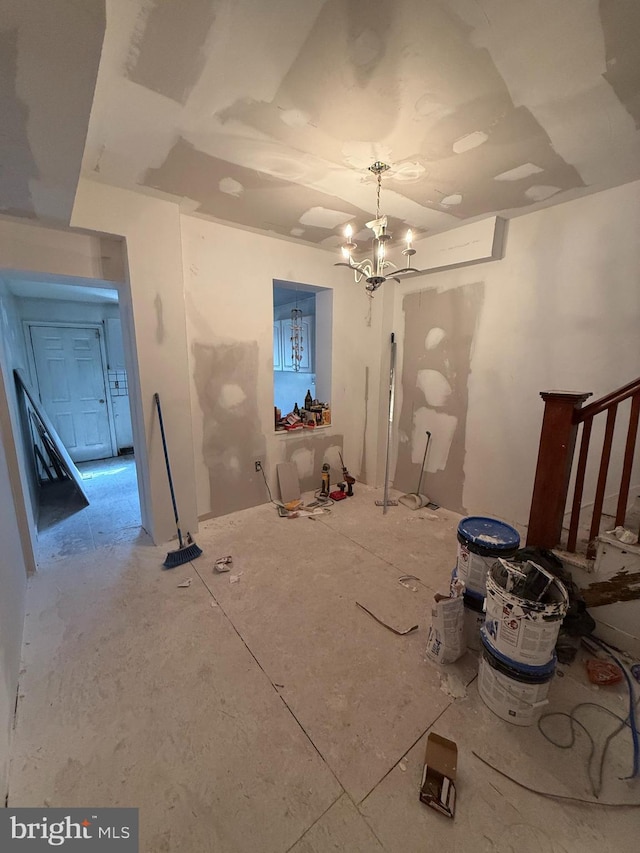 interior space featuring a notable chandelier