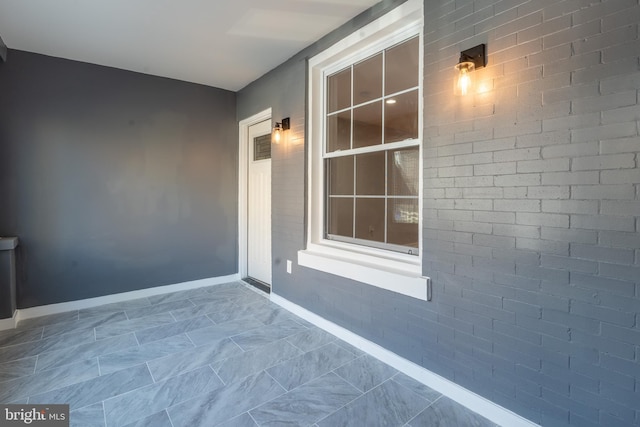 exterior space featuring baseboards