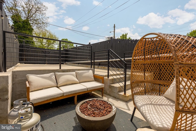 view of patio with a fenced backyard and an outdoor hangout area