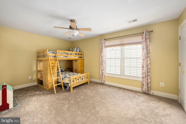 13073 Taverner Loop, Woodbridge, VA 22192 - bedroom with carpet floors, baseboards, visible vents, and ceiling fan