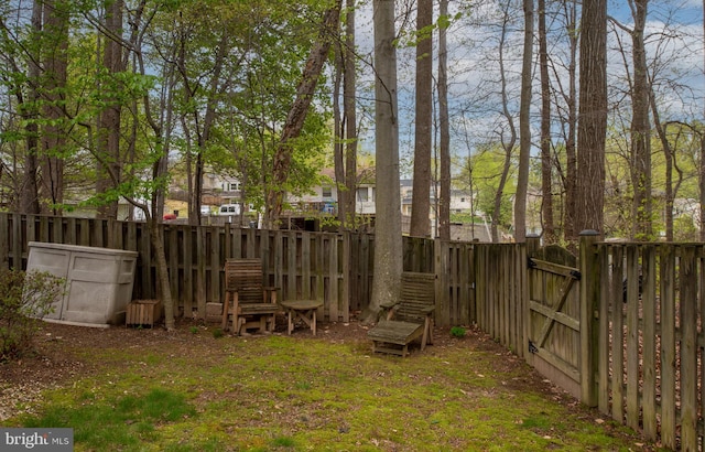 13073 Taverner Loop, Woodbridge, VA 22192 - view of yard with a gate and a fenced backyard