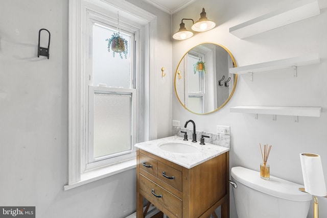 228 Morgan St, Phoenixville, PA 19460 - half bath featuring vanity, crown molding, and toilet