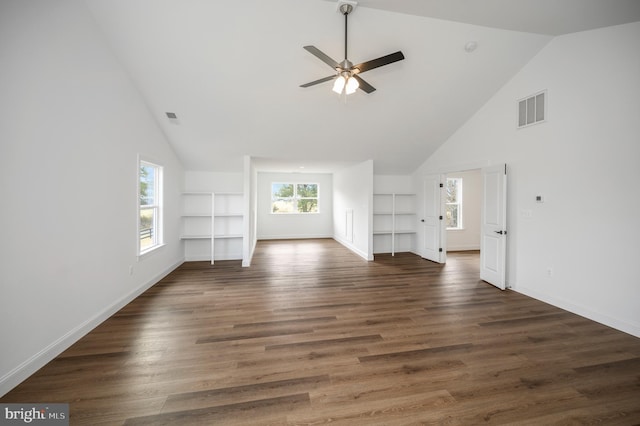 unfurnished living room featuring visible vents, a ceiling fan, baseboards, and high vaulted ceiling