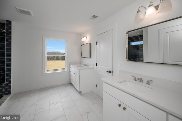 full bathroom featuring a sink, baseboards, marble finish floor, and visible vents