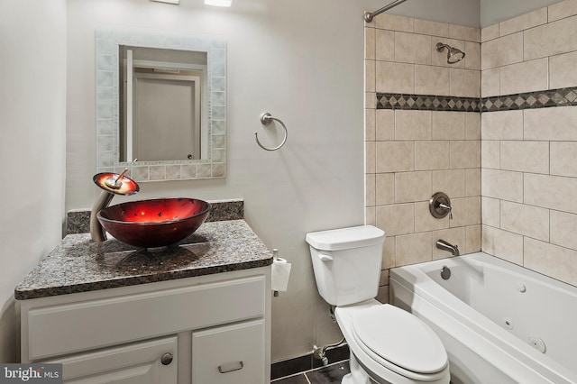 full bath with toilet, shower / bathing tub combination, and vanity