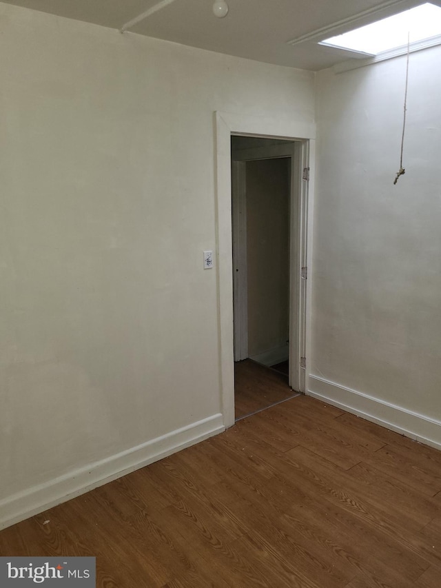 423 Furrow St, Baltimore, MD 21223 - spare room with baseboards and wood finished floors