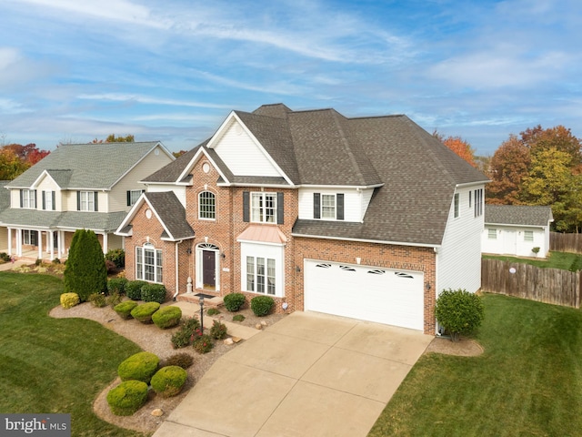 114 New Market Dr, Stephens City, VA 22655 - view of front of home with brick siding, driveway, an attached garage, and a shingled roof