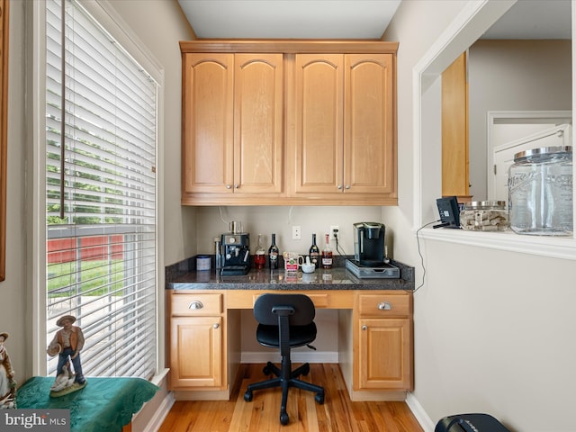 114 New Market Dr, Stephens City, VA 22655 - office space featuring built in desk, light wood-style floors, and baseboards