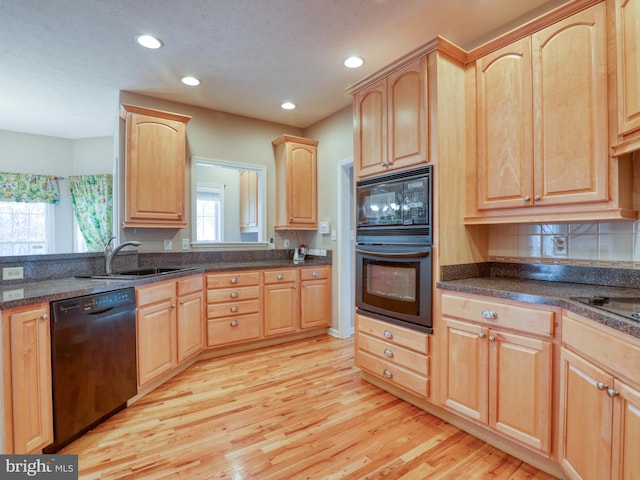 114 New Market Dr, Stephens City, VA 22655 - kitchen with black appliances, light brown cabinetry, light wood-style flooring, a sink, and recessed lighting