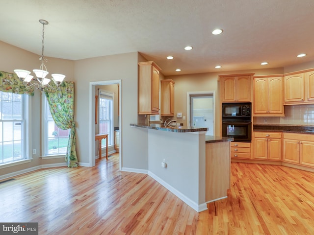 114 New Market Dr, Stephens City, VA 22655 - kitchen featuring black appliances, light brown cabinetry, light wood-type flooring, baseboards, and recessed lighting