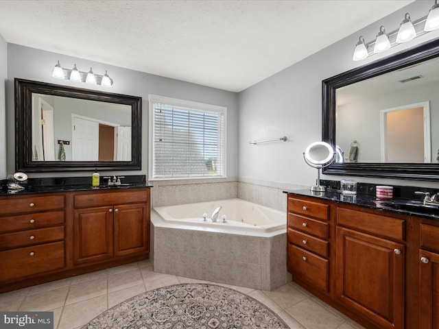 114 New Market Dr, Stephens City, VA 22655 - bathroom featuring tile patterned flooring, two vanities, and a jetted tub