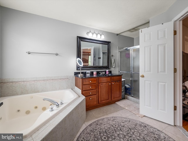 114 New Market Dr, Stephens City, VA 22655 - bathroom with a whirlpool tub, vanity, a stall shower, and tile patterned flooring