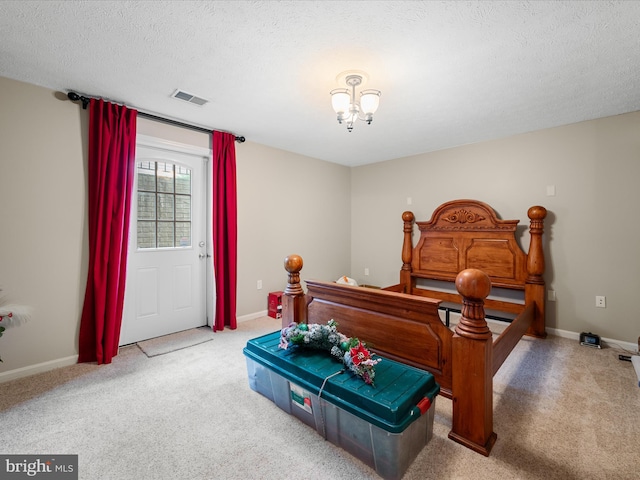 114 New Market Dr, Stephens City, VA 22655 - bedroom featuring a chandelier, carpet flooring, baseboards, and a textured ceiling