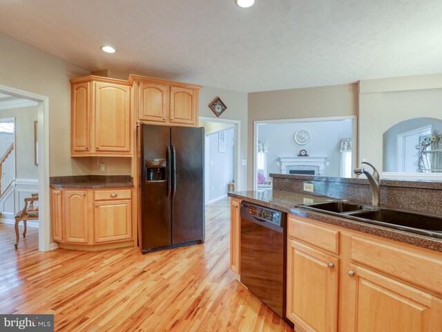 114 New Market Dr, Stephens City, VA 22655 - kitchen featuring black appliances, a sink, light brown cabinetry, light wood-style floors, and recessed lighting