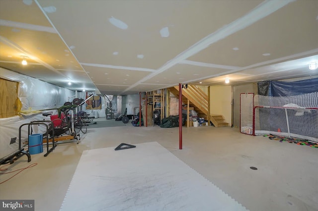 finished below grade area featuring stairs