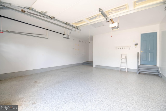 729 Rosecroft Ct, Forest Hill, MD 21050 - garage featuring a garage door opener and baseboards