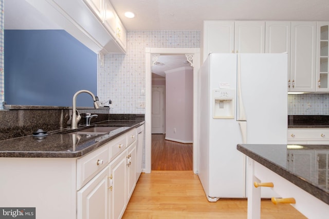 729 Rosecroft Ct, Forest Hill, MD 21050 - kitchen featuring white appliances, a sink, dark stone counters, and light wood finished floors