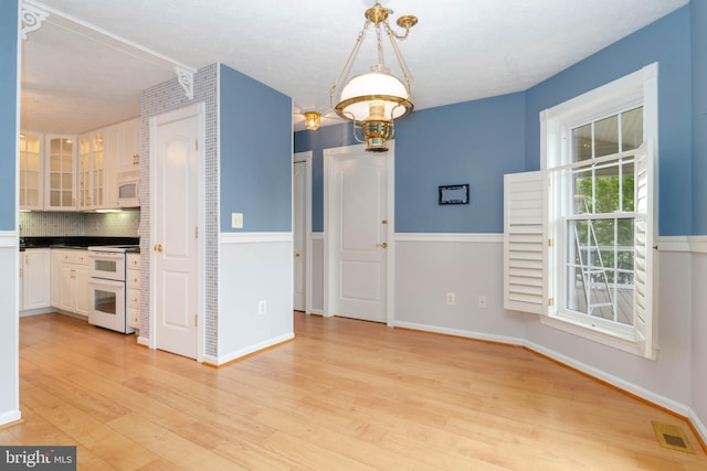 729 Rosecroft Ct, Forest Hill, MD 21050 - unfurnished dining area with light wood-type flooring and baseboards