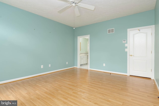 729 Rosecroft Ct, Forest Hill, MD 21050 - unfurnished room with light wood-style flooring, baseboards, a ceiling fan, and a textured ceiling