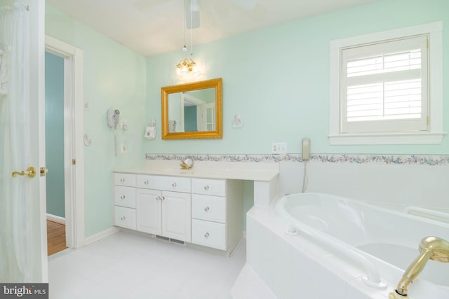 729 Rosecroft Ct, Forest Hill, MD 21050 - full bathroom with vanity, a garden tub, ceiling fan, and baseboards