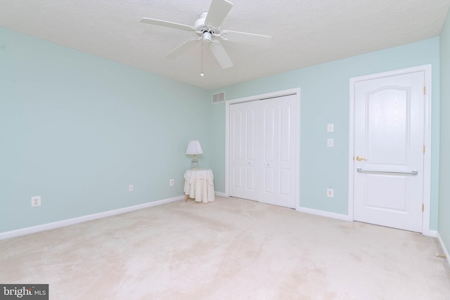 729 Rosecroft Ct, Forest Hill, MD 21050 - unfurnished bedroom featuring a closet, baseboards, carpet floors, and a textured ceiling