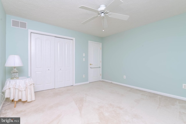 729 Rosecroft Ct, Forest Hill, MD 21050 - unfurnished bedroom with carpet floors, a closet, baseboards, a textured ceiling, and ceiling fan
