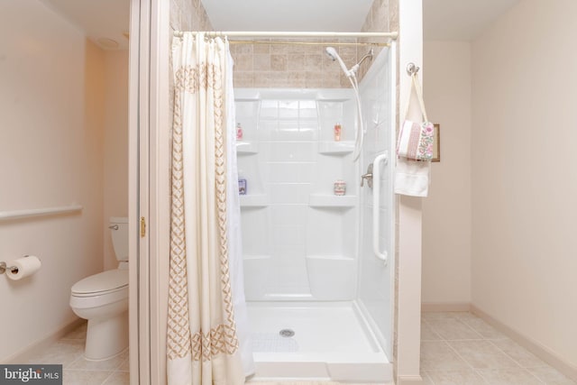 729 Rosecroft Ct, Forest Hill, MD 21050 - bathroom with toilet, a stall shower, tile patterned flooring, and baseboards