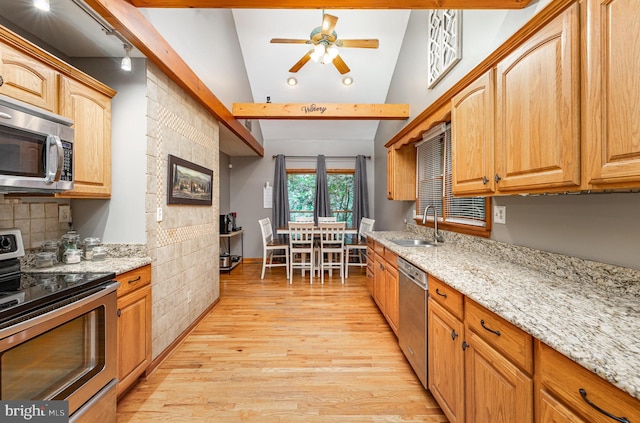 120 Hartwood Meadows Dr, Fredericksburg, VA 22406 - kitchen with appliances with stainless steel finishes, a sink, light wood-type flooring, ceiling fan, and light stone countertops
