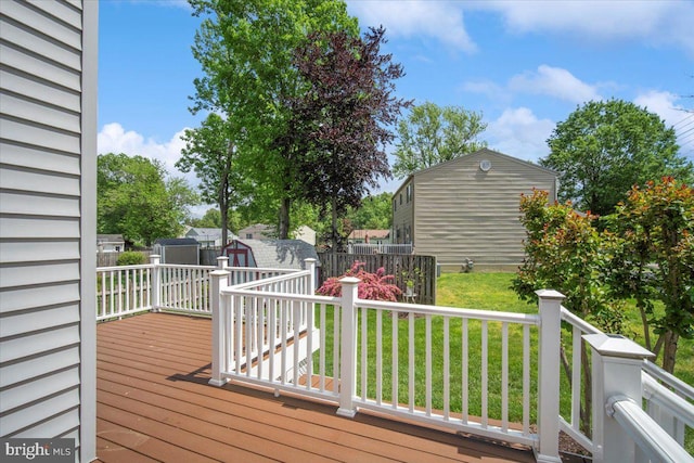 9402 Glen Ridge Dr, Laurel, MD 20723 - wooden deck featuring a storage shed and an outdoor structure