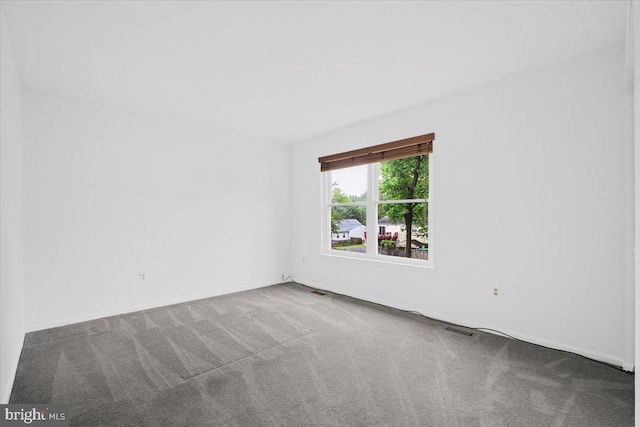 9402 Glen Ridge Dr, Laurel, MD 20723 - carpeted empty room with baseboards