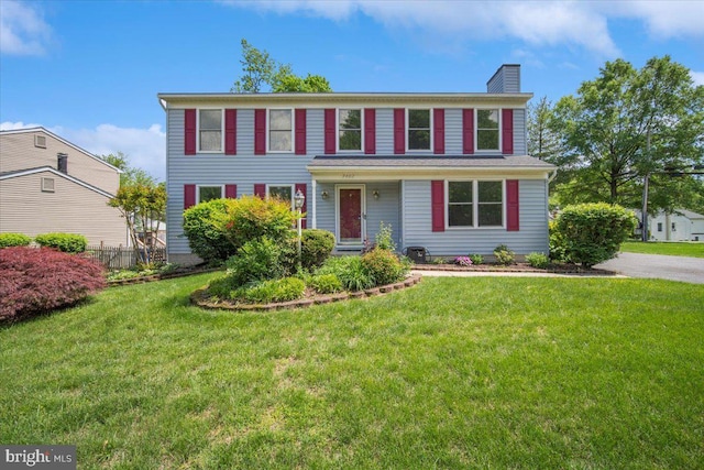9402 Glen Ridge Dr, Laurel, MD 20723 - colonial-style house featuring a chimney