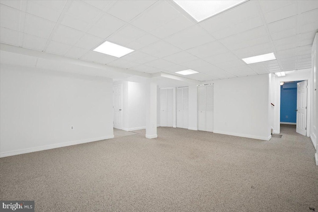 9402 Glen Ridge Dr, Laurel, MD 20723 - carpeted empty room with a drop ceiling and baseboards