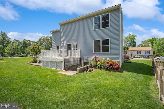 9402 Glen Ridge Dr, Laurel, MD 20723 - rear view of house featuring a deck and a lawn