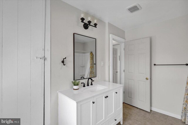 304 Charles Rd, Lancaster, PA 17603 - bathroom featuring vanity, tile patterned floors, a shower with shower curtain, baseboards, and visible vents