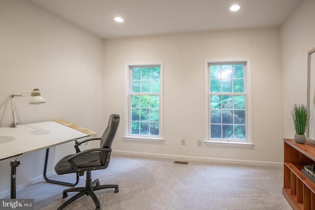 carpeted office with plenty of natural light, baseboards, and recessed lighting