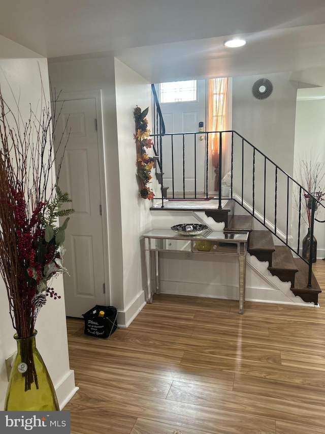 1305 Wendover Ct, District Heights, MD 20747 - foyer entrance featuring stairway, wood finished floors, and baseboards
