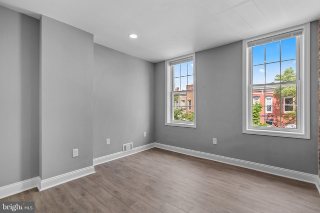 1213 Washington Blvd, Baltimore, MD 21230 - empty room featuring wood finished floors, baseboards, and recessed lighting